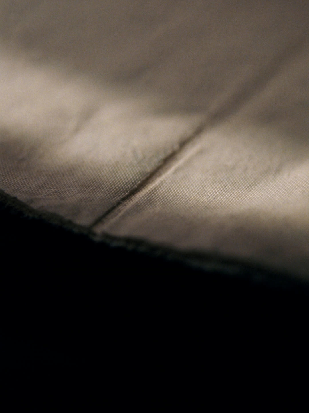Soft folded linen in warm light